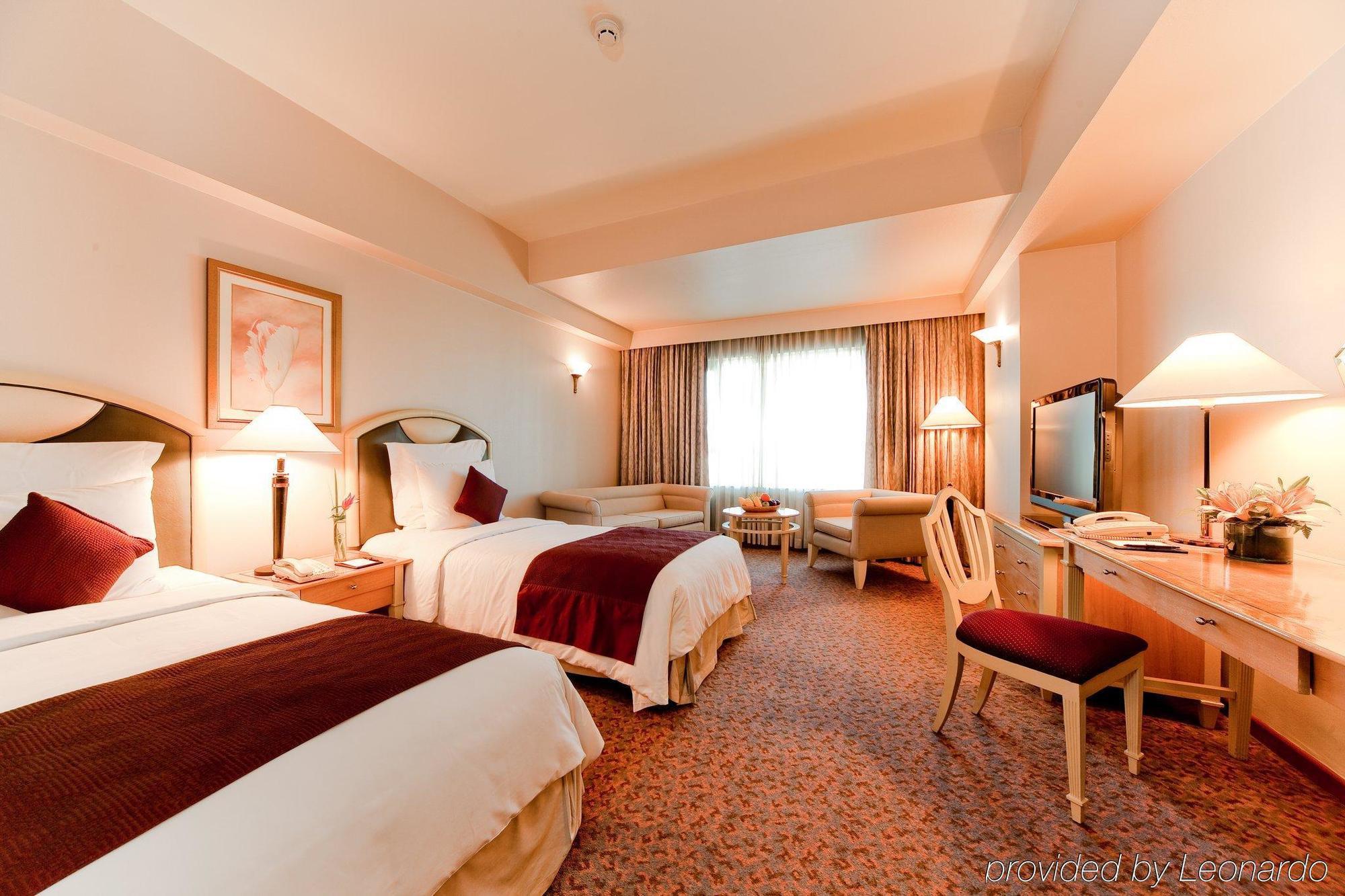 โรงแรมนิวเวิลด์ มากาตี Makati City ห้อง รูปภาพ